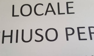 locale-chiuso-cartello